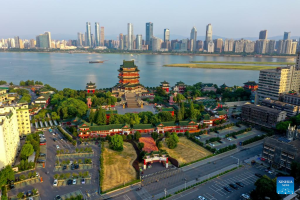 Tengwang Pavilion with city skyline backdrop