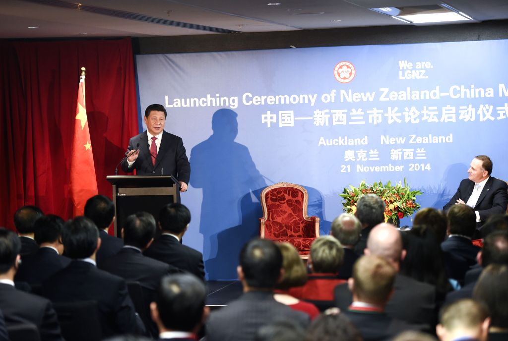 Then-Prime Minister John Key at the 2014 launch event announcing the NZ-China Mayoral Forum initiative alongside President Xi Jinping.