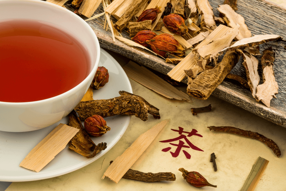 Traditional Chinese herbal tea being prepared as part of a TCM wellness practice, reflecting the holistic approach to health shared between Rongoā Māori and Traditional Chinese Medicine