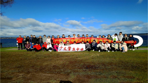 Group photo by the water.