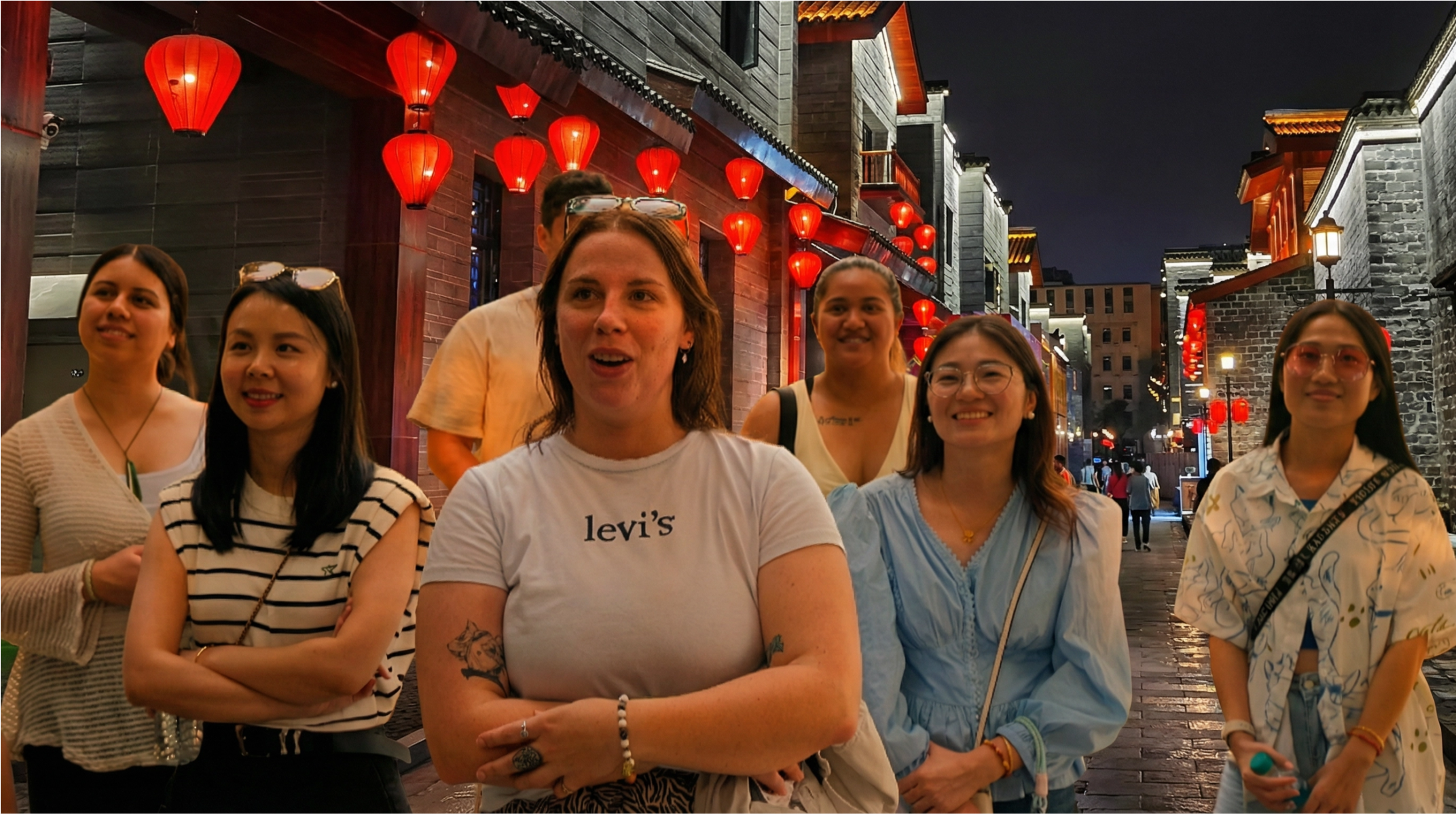 A large group of Eastern Bridge volunteers in Nanchang, China, celebrating the start of their programme. The 2026 programme will send 130 volunteers to six provinces.