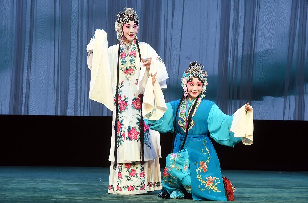 Gan opera performers in traditional costume on stage in Jiangxi