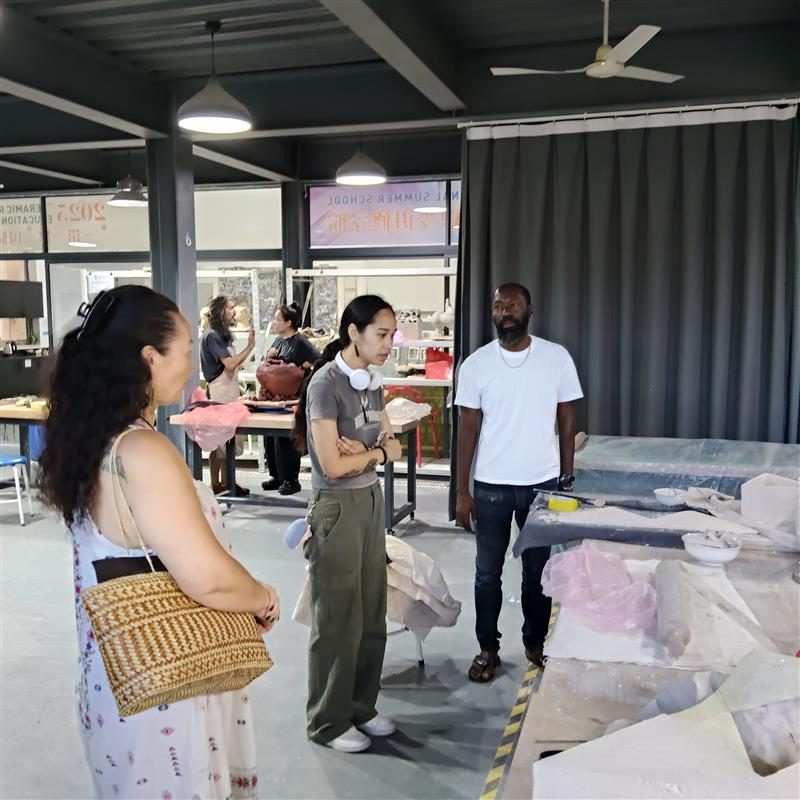 Volunteers at a hands-on arts and crafts workshop